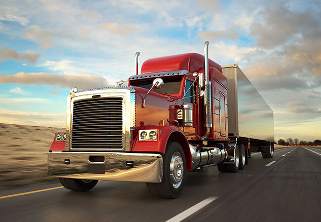 tdg-category-semi-truck-driving-down-road
